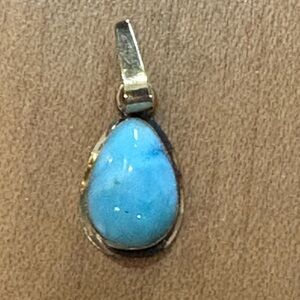14k gold necklace pendant Larimar stone which comes from the Dominican Republic